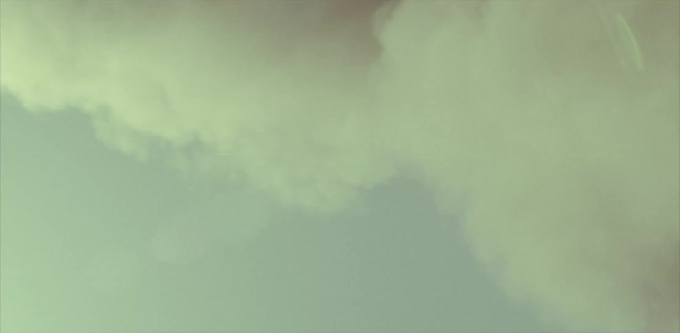 Smoke billows up into the sky