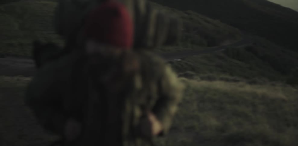 Bearded man backpacking on a cold day