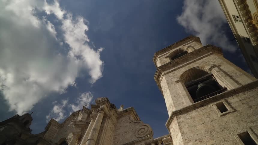 Clouds over a stone church