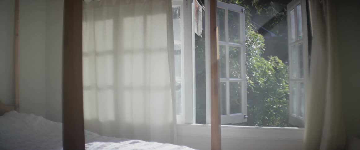Sunlight shining through a bedroom window