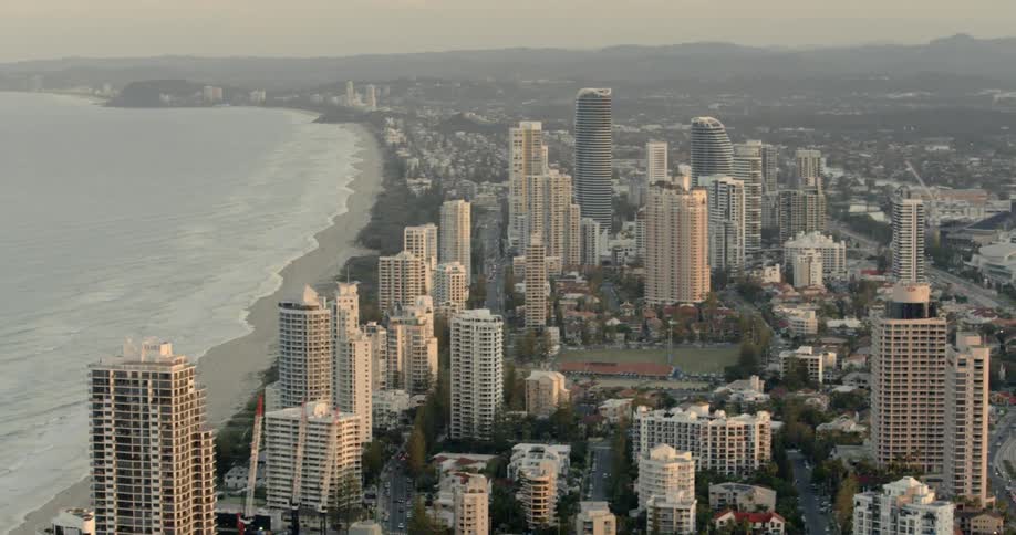 The city has tall buildings right near the water