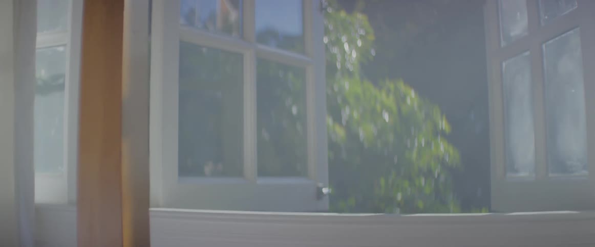Sun shining in a bedroom window
