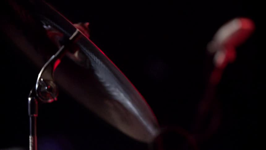 Cymbal getting hit with drumstick