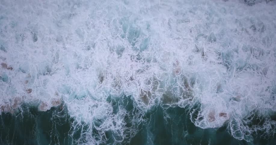 Ocean waves crash down
