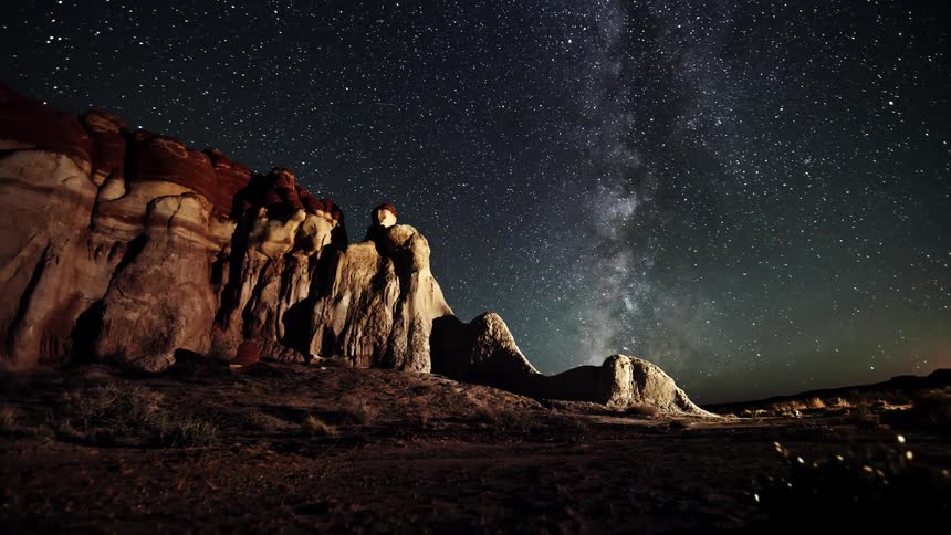 Shooting stars and a clear night sky over mountains