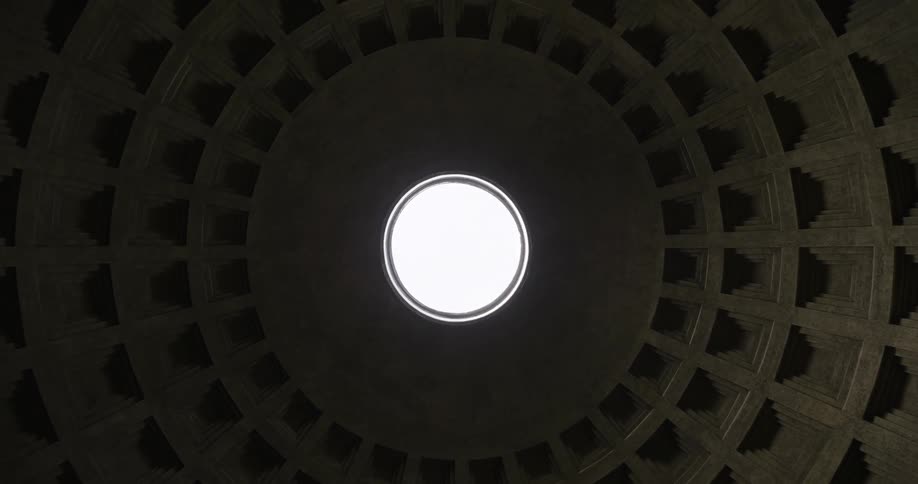 The ceiling has a single circular window at the top