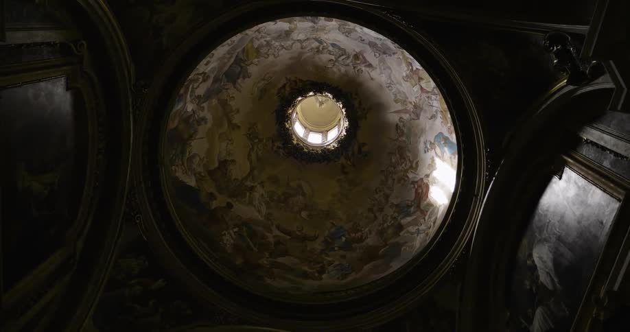 A painted mural covers a domed ceiling