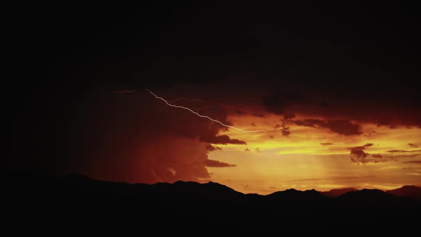 Large storm clouds fill the dawn sky