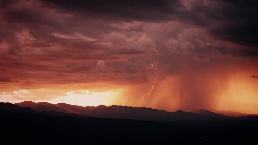 Storm clouds pour rain ahead