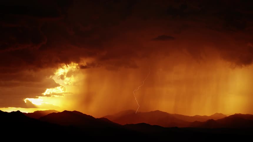 Lightning flashes during a rainstorm in the mountains