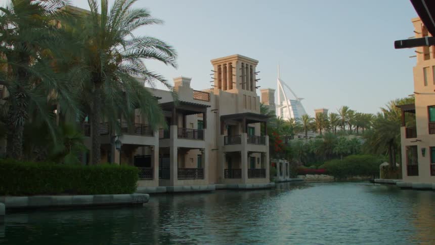 Stream flows in between buildings in a city