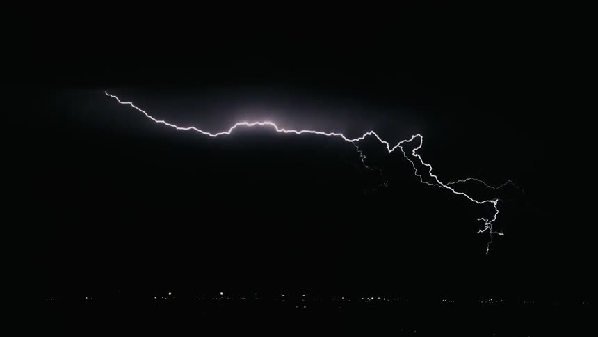 Lightning striking plains at night