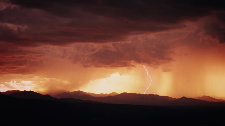 Lightning flashes from gathered storm clouds