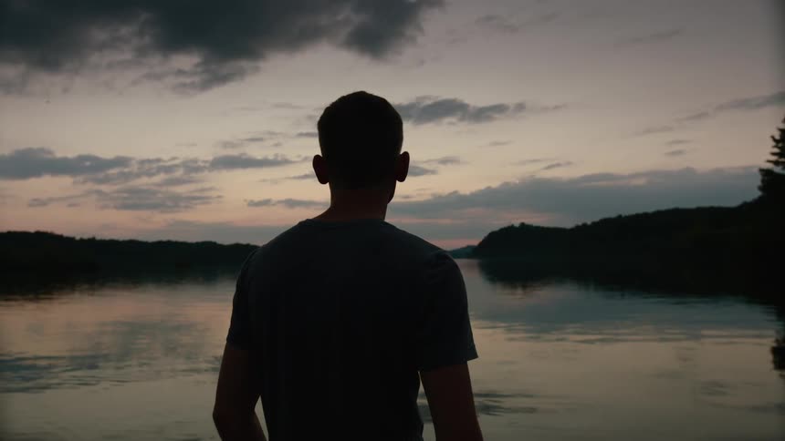 A person staring off at the horizon