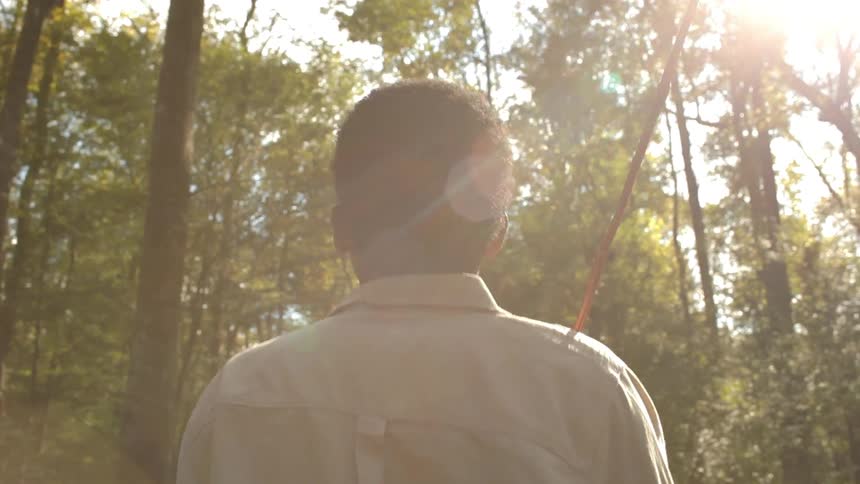 Man walking through the forest