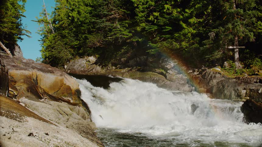 Rainbow shines over roaring rapids