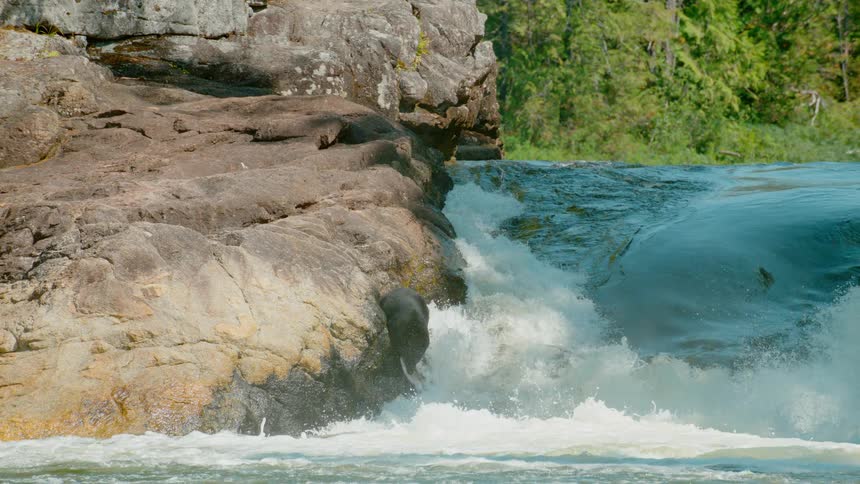 A short waterfall near some rocks