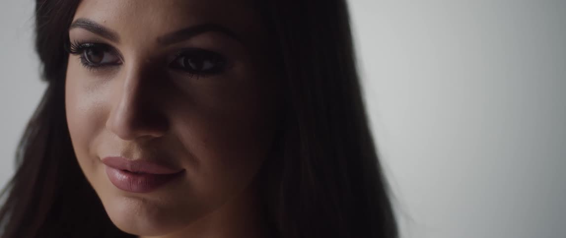 A woman with long eyelashes