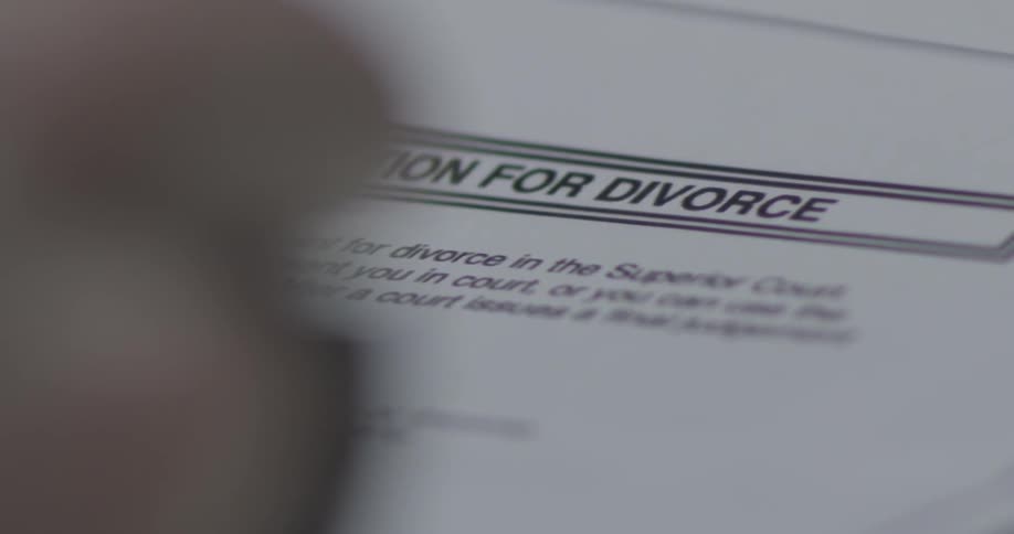 Divorce papers are seen