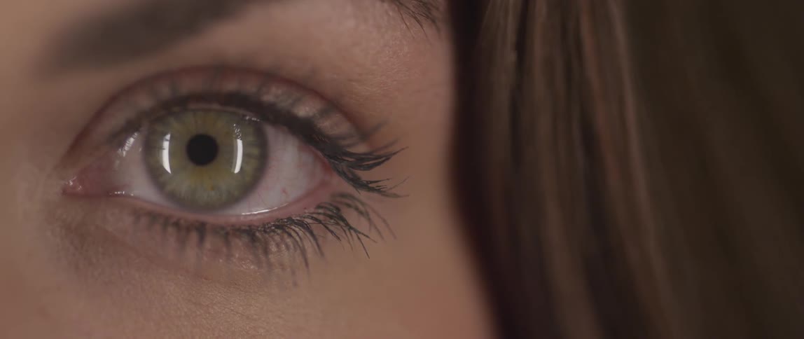 Close up of a persons eye blinking
