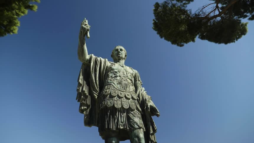 A tall statue is off a man