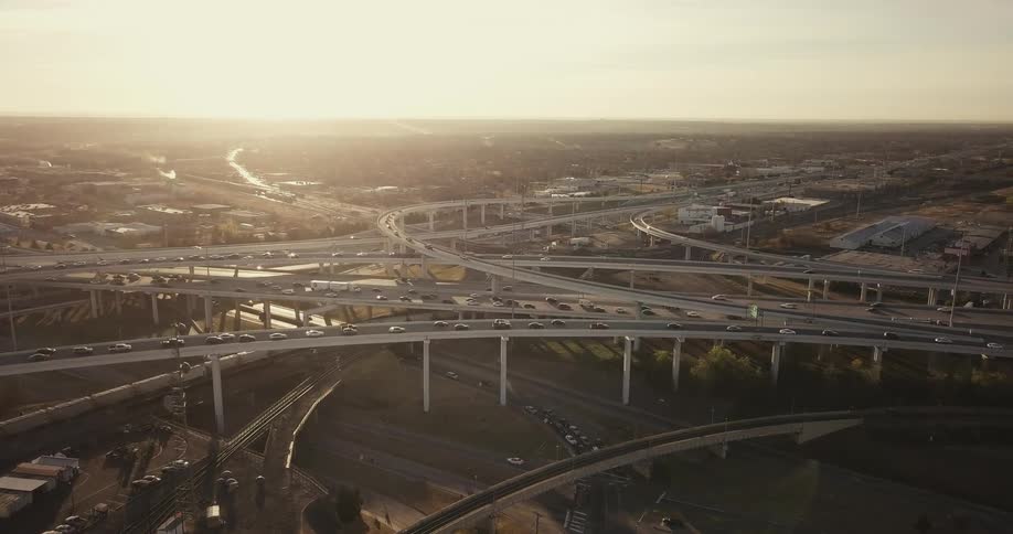 Busy highways in a city at sunrise
