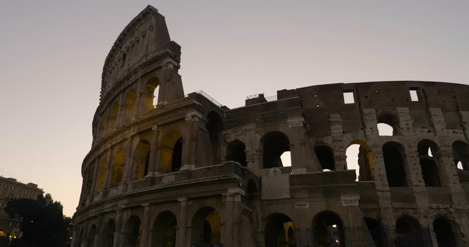 The colosseum is shown at sunset