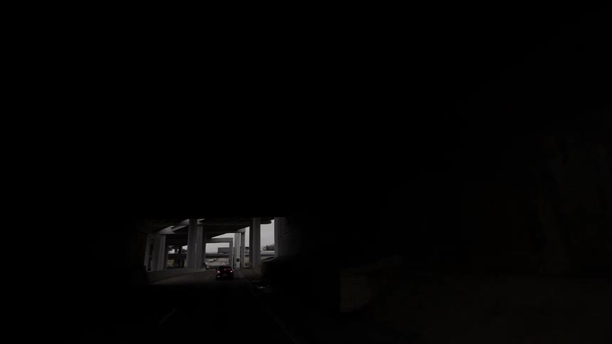 Traveling view on a road going through a tunnel