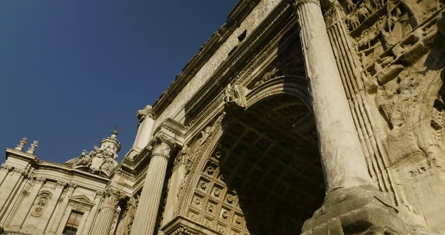 A carved stone archway stands overhead