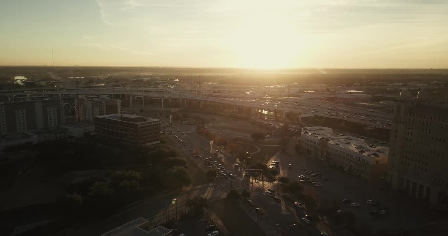 Sun rising over highways