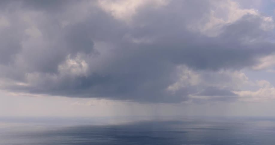 Clouds float above the ocean