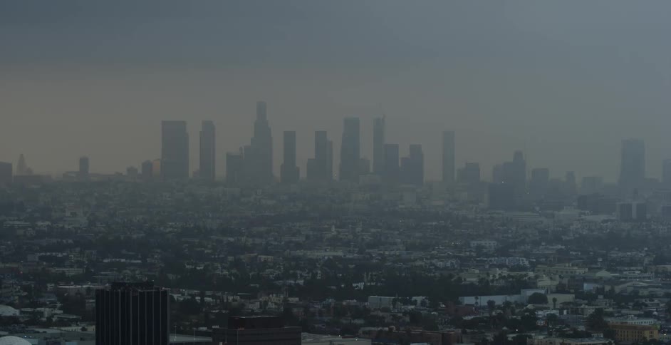 View of city skyline on a foggy day