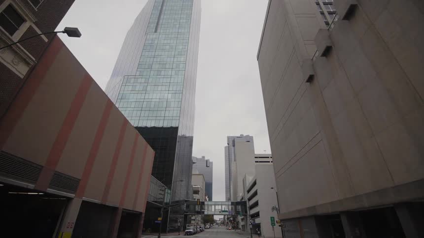 City buildings line a street