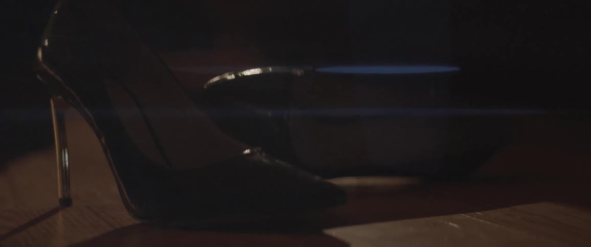 The window is reflecting light at night