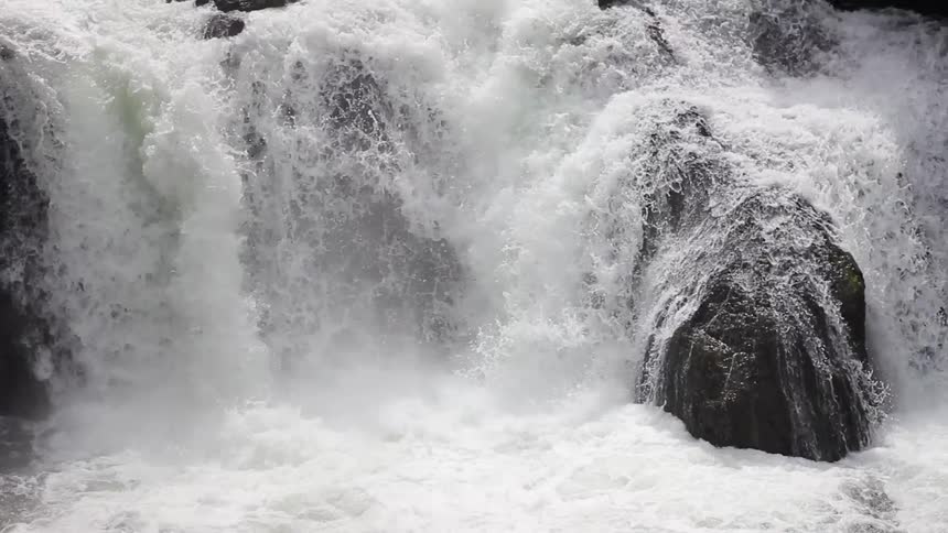 Water flows and cascades over rocks