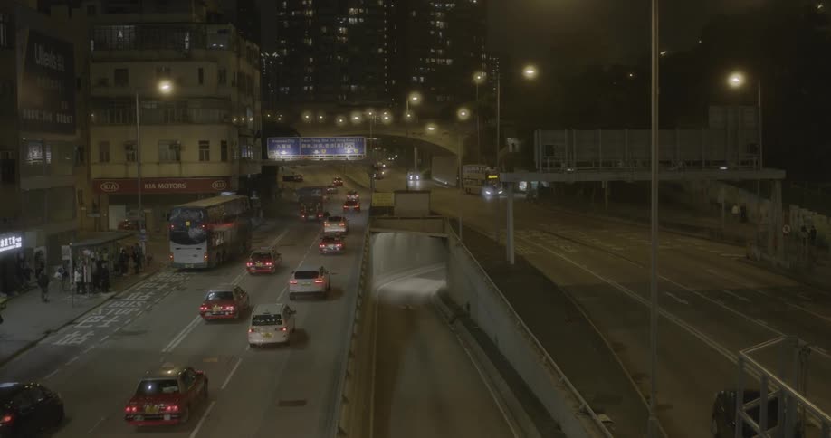Cars traveling on city freeway at night