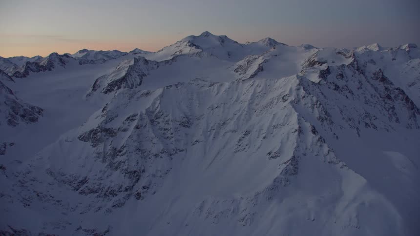 The mountains are completely covered with snow ahead