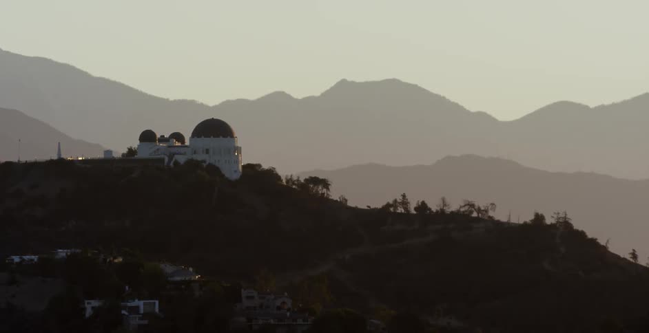 A large domed building sits on the hilltop