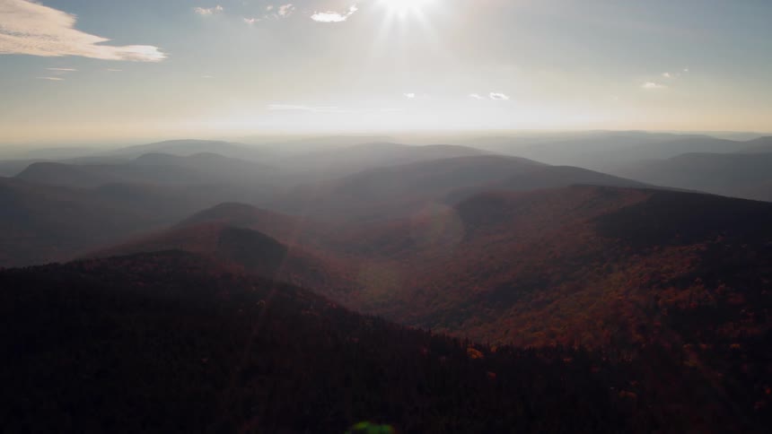 Sunlight shining over mountain wilderness