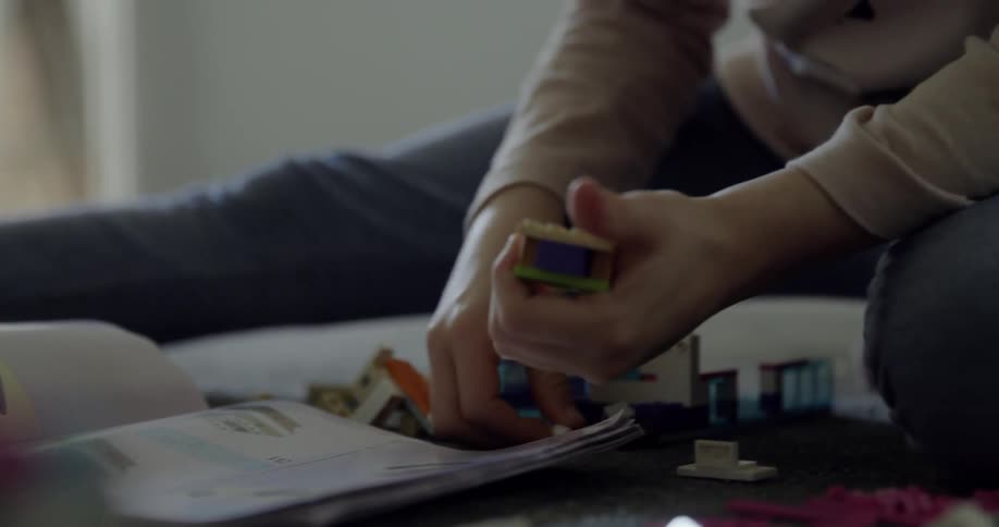 A child plays with legos