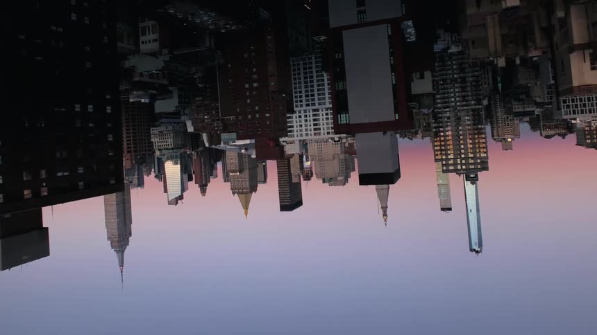 Sunset over an upside down city skyline