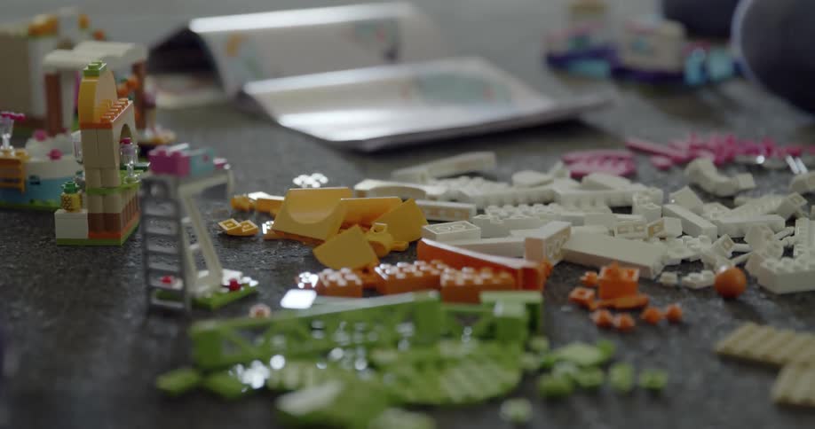 A child is playing with leggos