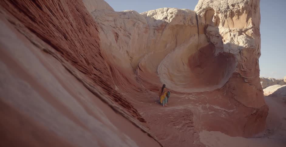 A woman is exploring a cavern