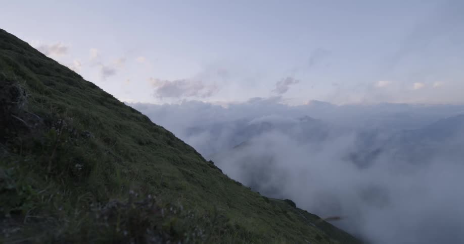 Clouds and fog pass through mountains