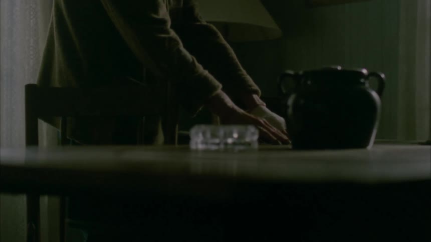 Blind woman feels around a table until finding a set of keys