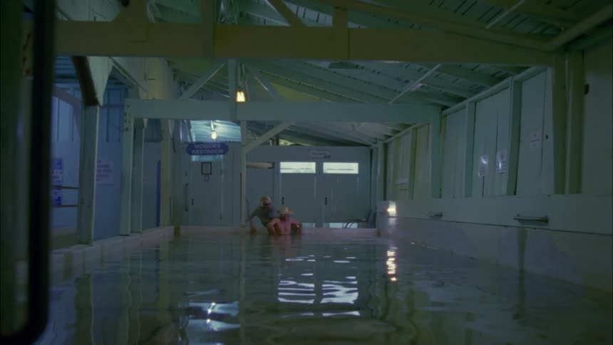 People sit in a pool together