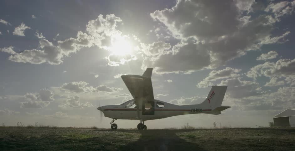 A plane rides down a tarmac