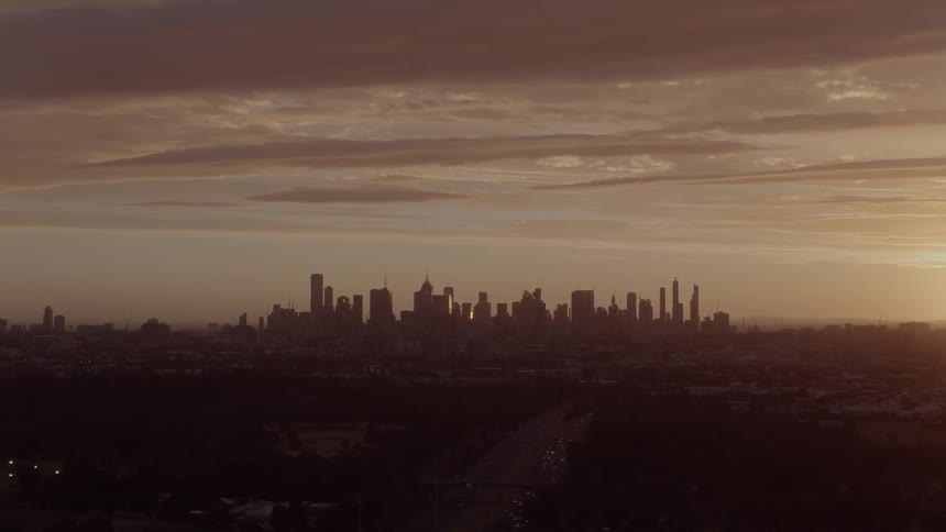 A large city on a partly cloudy day
