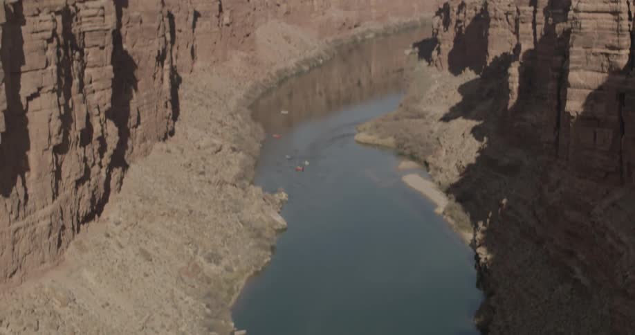 Water runs in a river in a deep canyon gorge