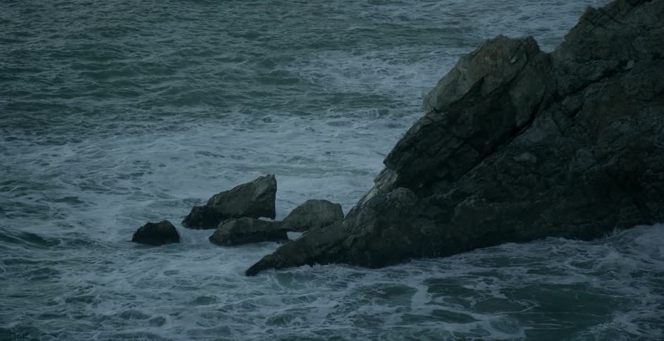 Waves splashing against rocks